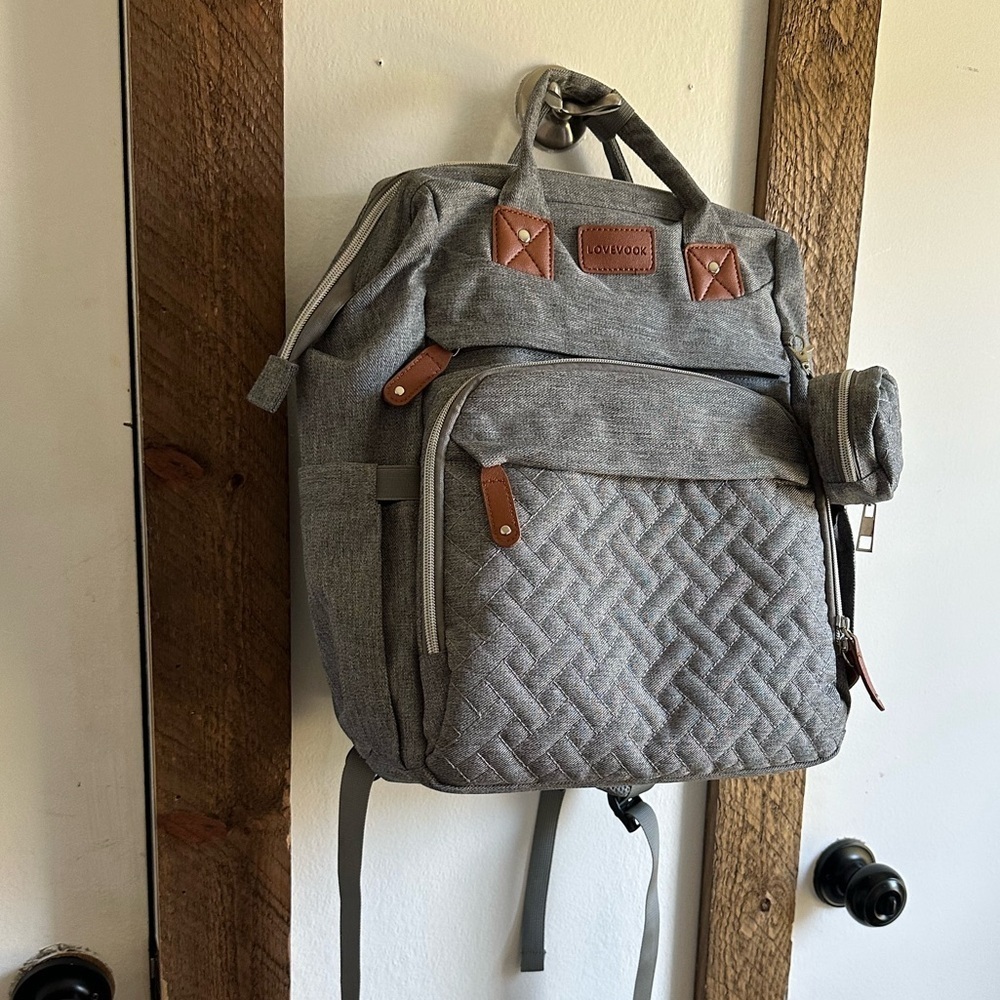 Boutique Large Diaper Bag, Backpack, Bassinet, Tech Charging Station all in one
